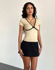 Image of Tasina Top in Kokosnussmilch mit schwarzem Einband