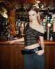 Image of Calypso Schulterfreies Top aus Lurex mit Goldstreifen
