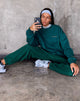 Image of Glo Sweatshirt in Flaschengrün mit Take Care Of Yourself Stickerei