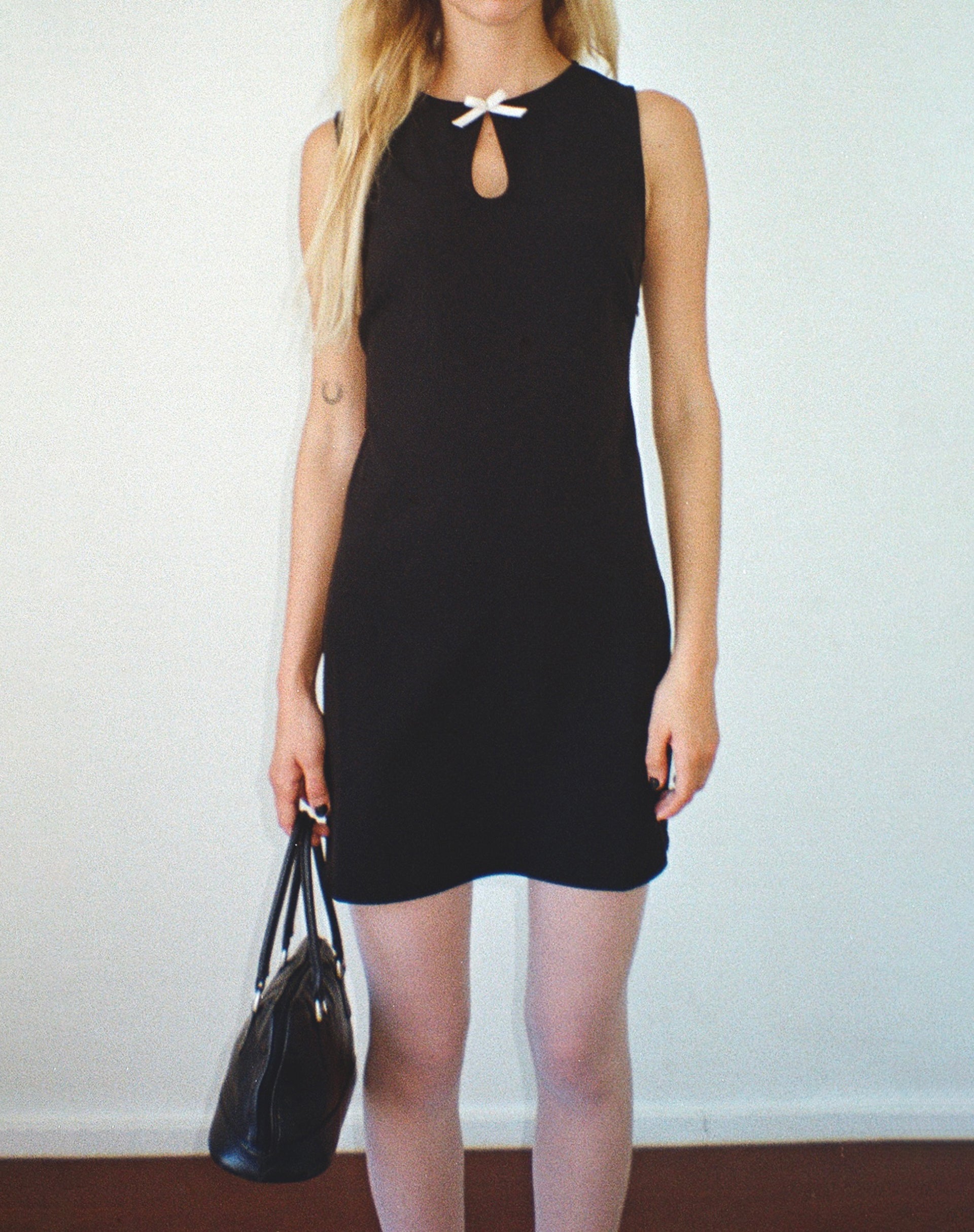 Image of Bibidia Minikleid in Schwarz mit cremefarbener Schleife