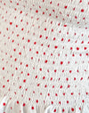 Weißes und rotes Polkadot