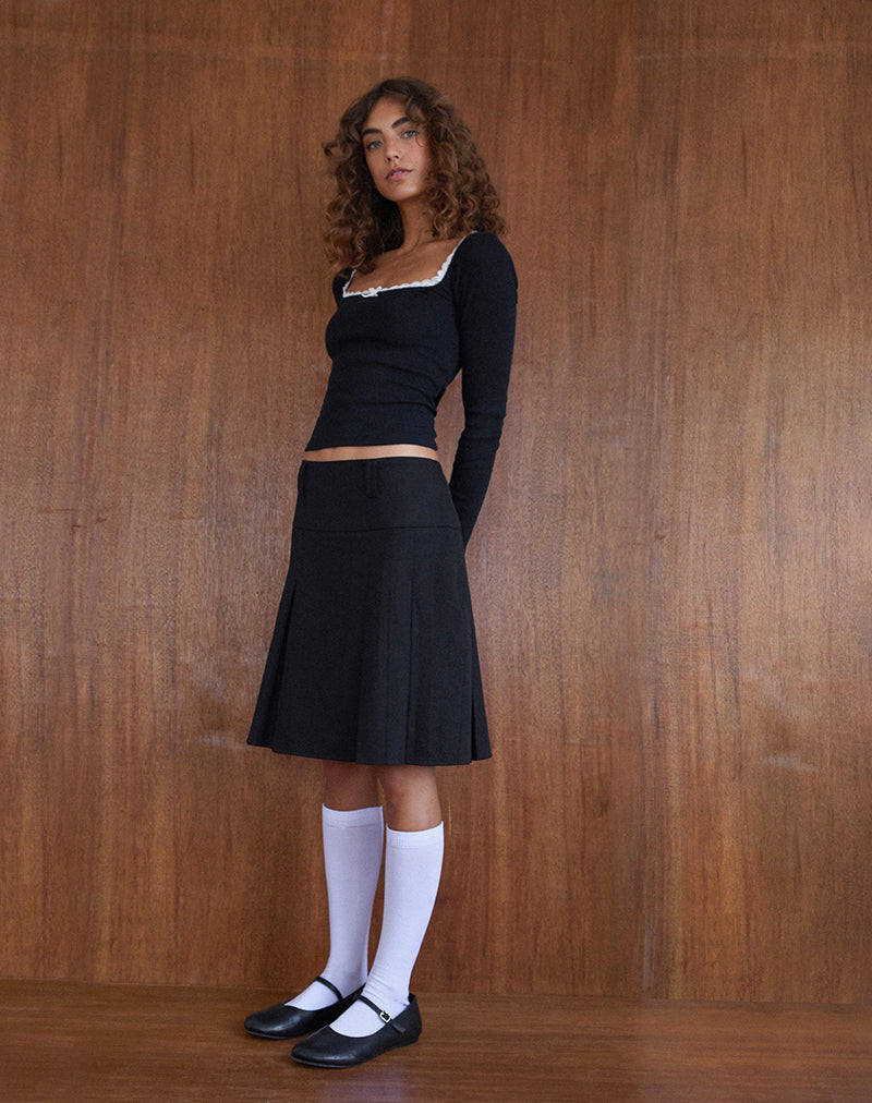 Image of Bovita Langärmeliges Top in Schwarz mit weißem Saum