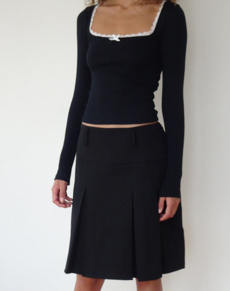 Image of Bovita Langärmeliges Top in Schwarz mit weißem Saum