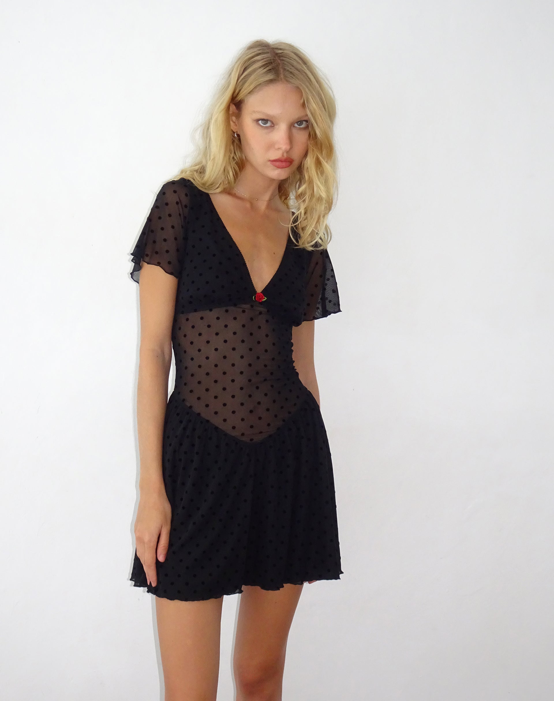 Image of Geni Minikleid in Polka Schwarz Flock