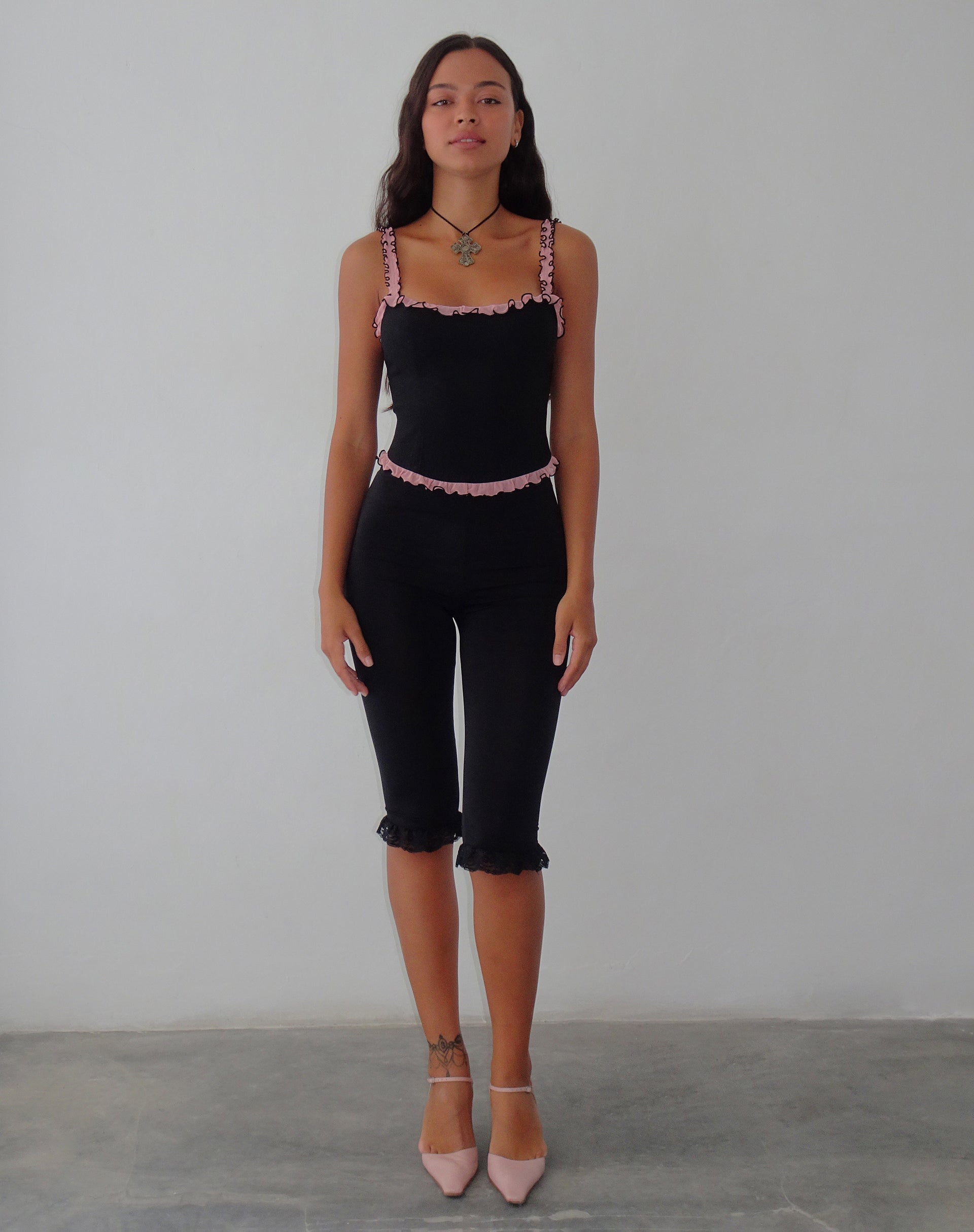 Image of Idalia Korsett-Top in Schwarz mit rosa Mesh-Rüsche