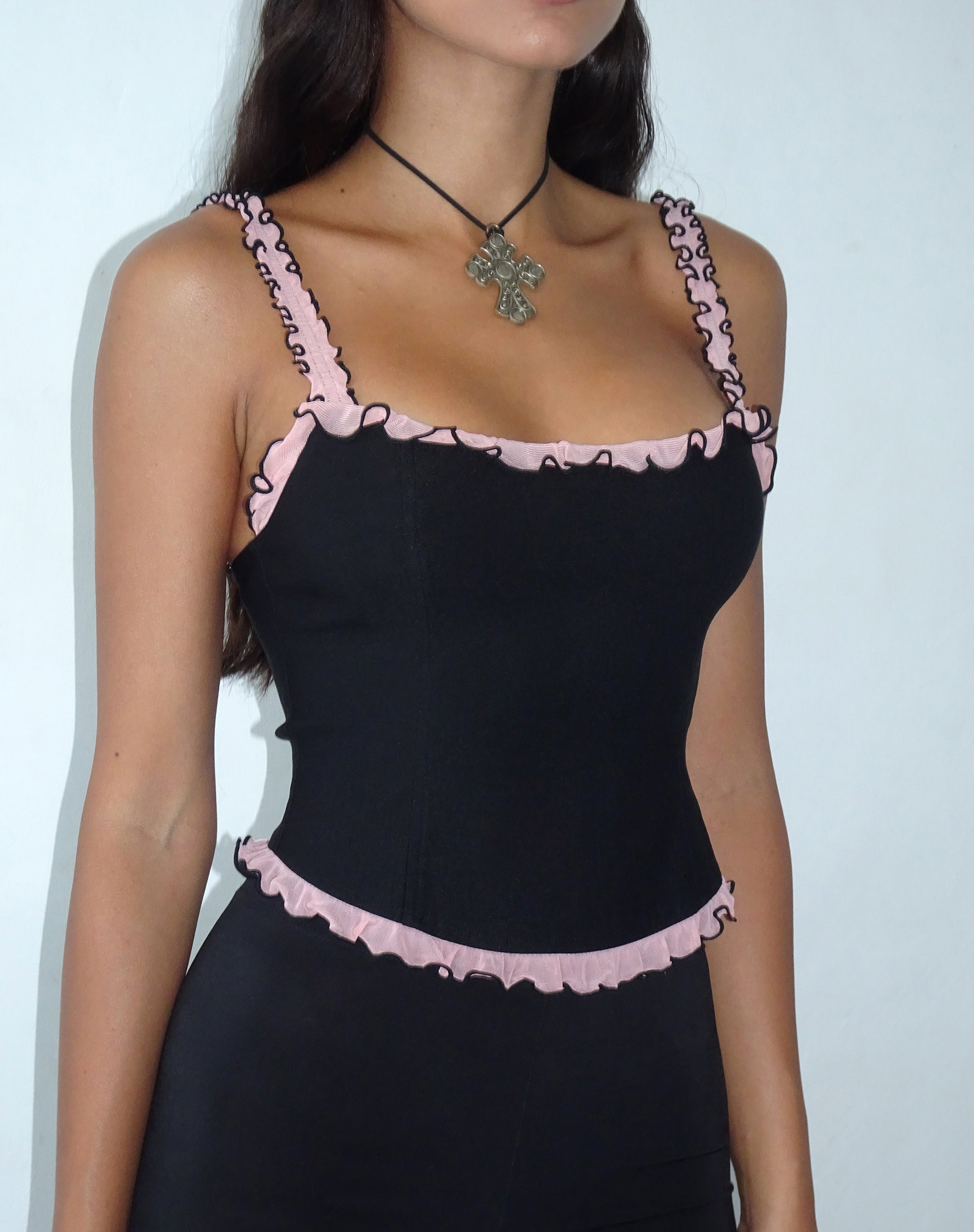 Image of Idalia Korsett-Top in Schwarz mit rosa Mesh-Rüsche