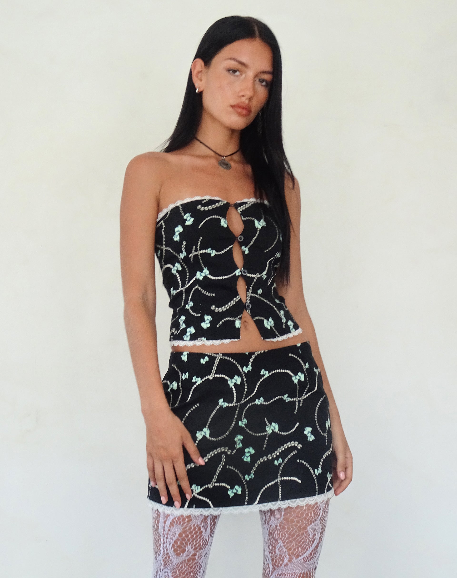 Bild von Lacur Bandeau Korsett in Schwarz mit Perlen- und Schleifenprint