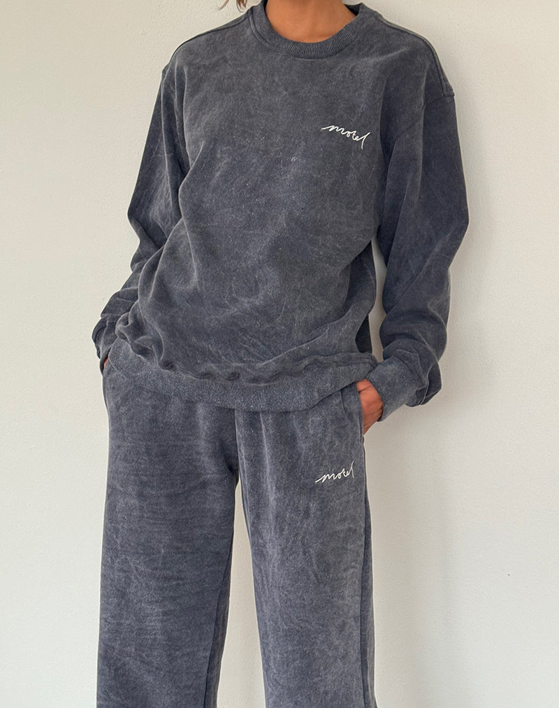 Image of Lockere Jogger in schwarzer Waschung mit weißer 'MOTEL'-Stickerei