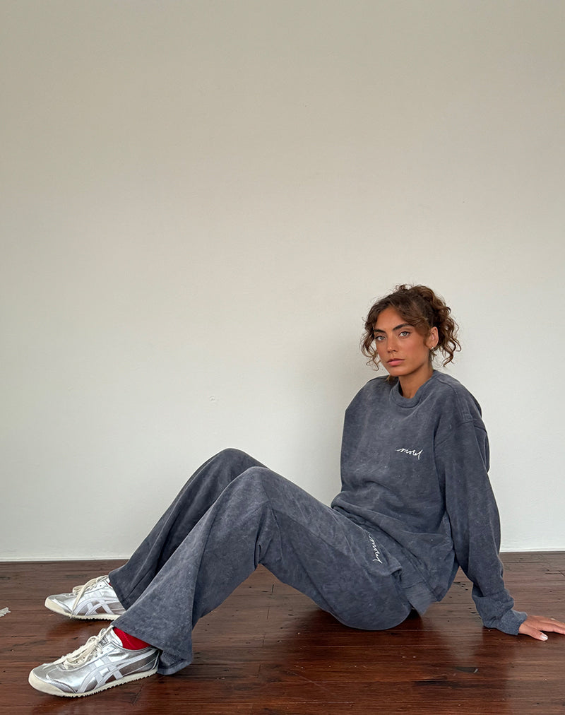 Image of Lockere Jogger in schwarzer Waschung mit weißer 'MOTEL'-Stickerei