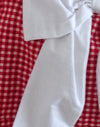 rote Gingham mit weißer Schleife
