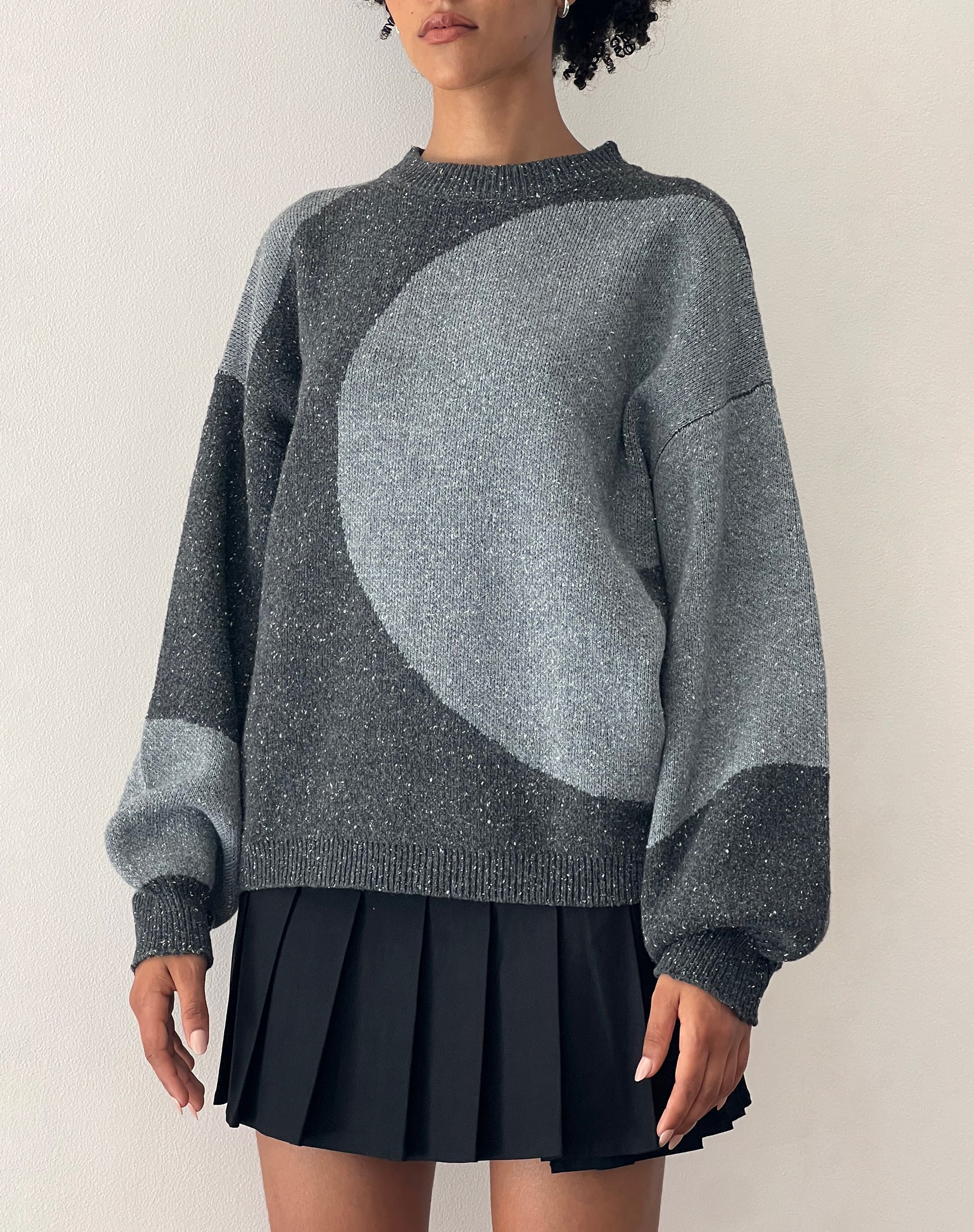Image of Namari Pullover aus schwarzem und anthrazitfarbenem Mischstrick