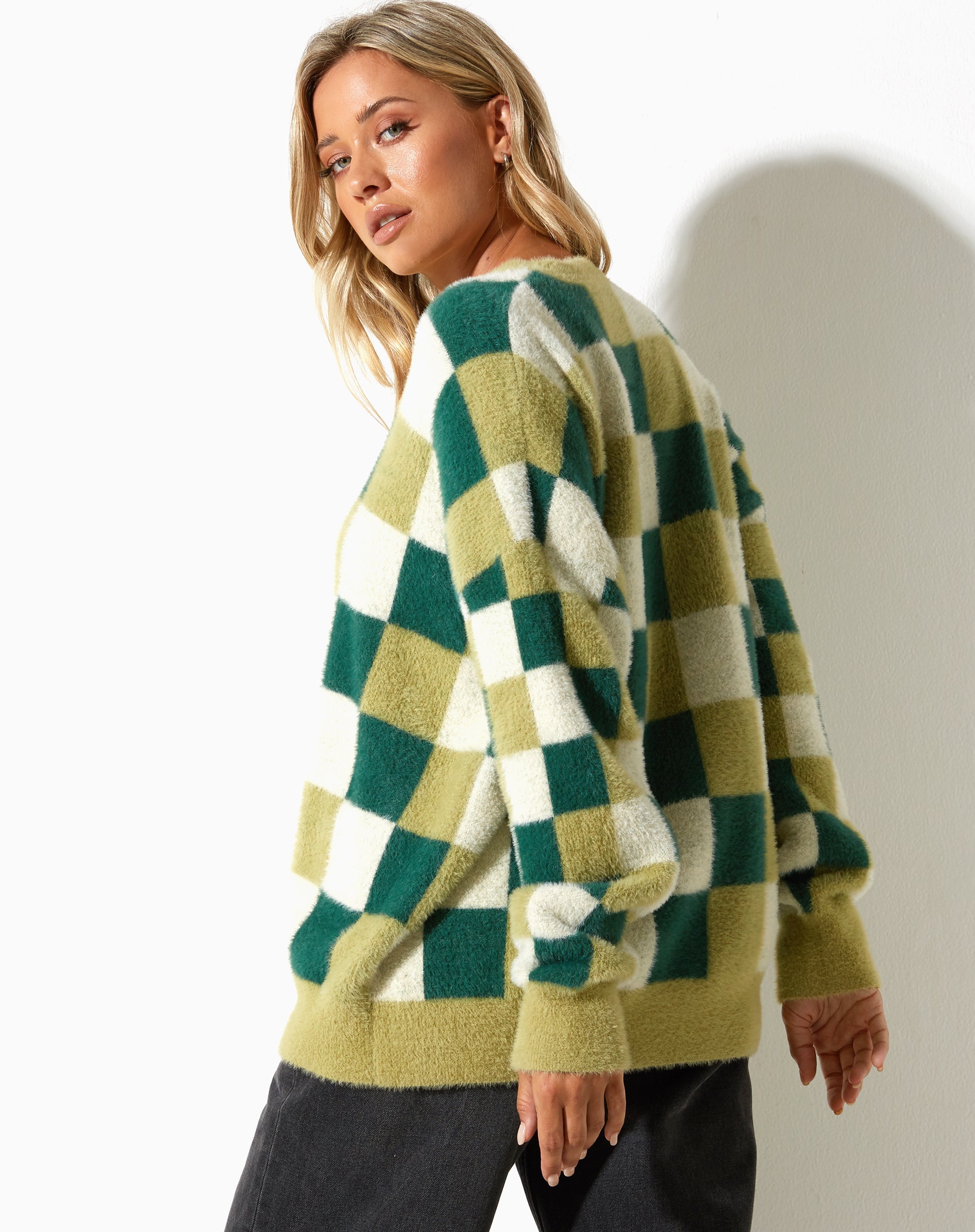 Abbildung des Namari Pullovers in Karo Grün Creme