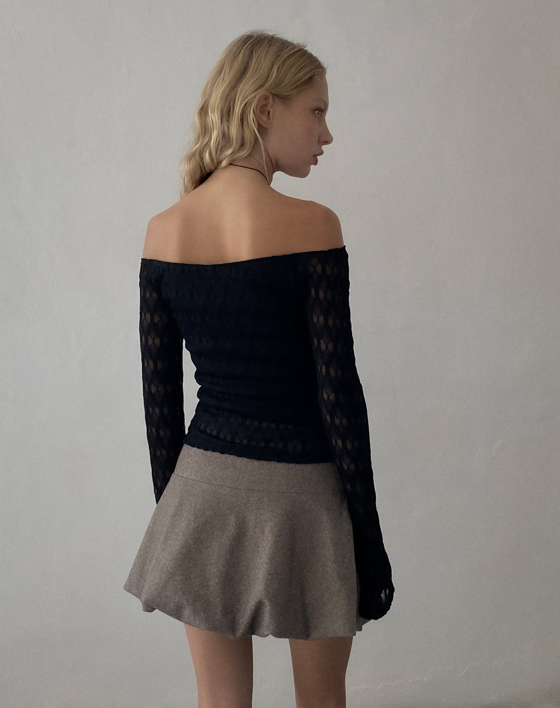 Image of Neira Langärmeliges Bardot-Top aus strukturiertem Strick Schwarz