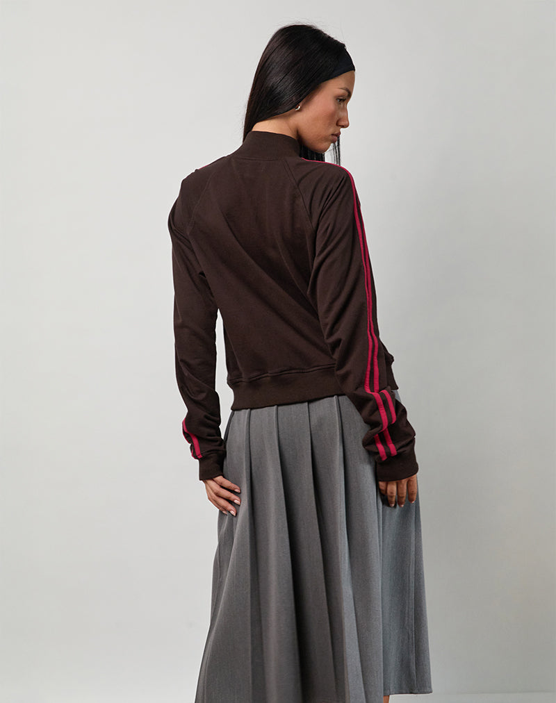 Image of Niskala Jacke in Bitter Chocolate mit Adrenaline Red Binding und Stickerei