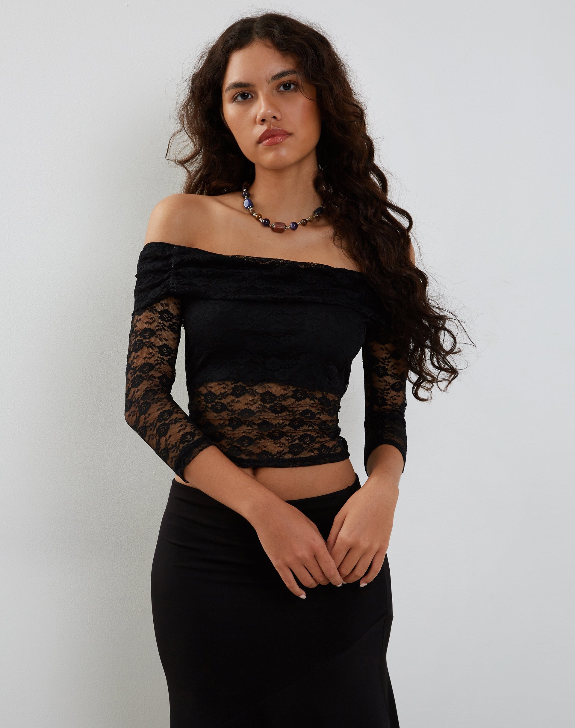 Image of Nixie Langärmeliges Bardot-Top aus Spitze Schwarz