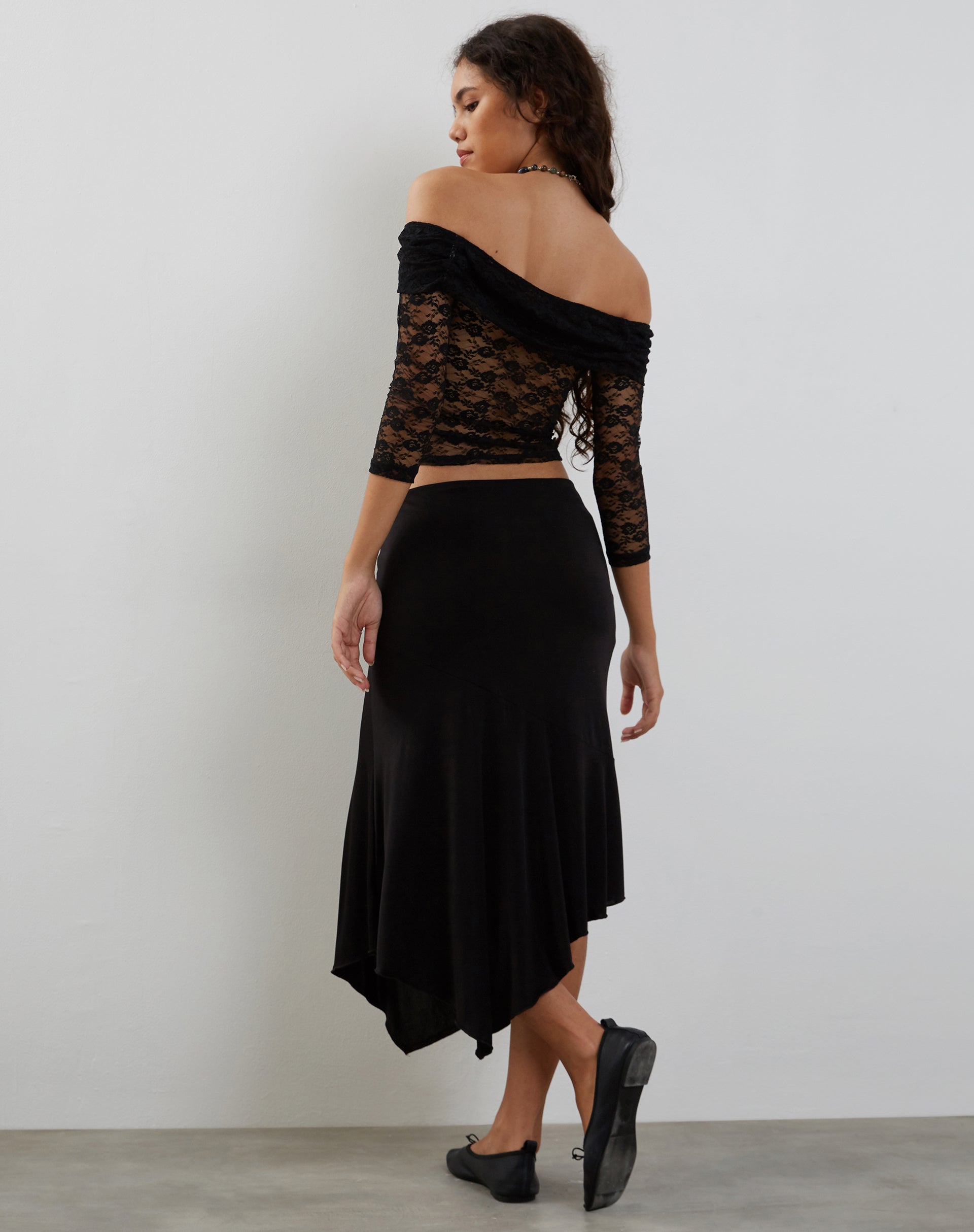Image of Nixie Langärmeliges Bardot-Top aus Spitze Schwarz