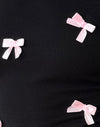 Schwarz mit rosa Schleifen
