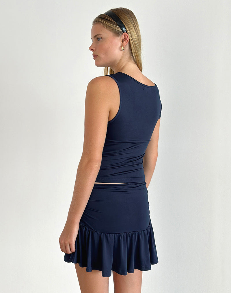 Abbildung von Rayla Top aus Lycra Dunkelmarine mit roter Rosette