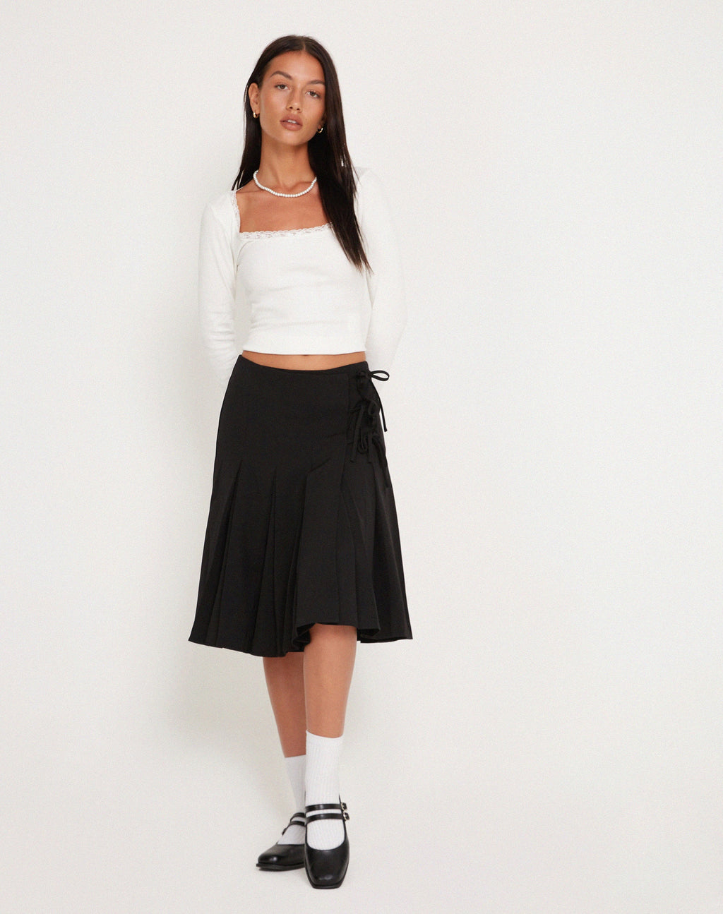 Madelyn Plissierter Midirock in Schwarz