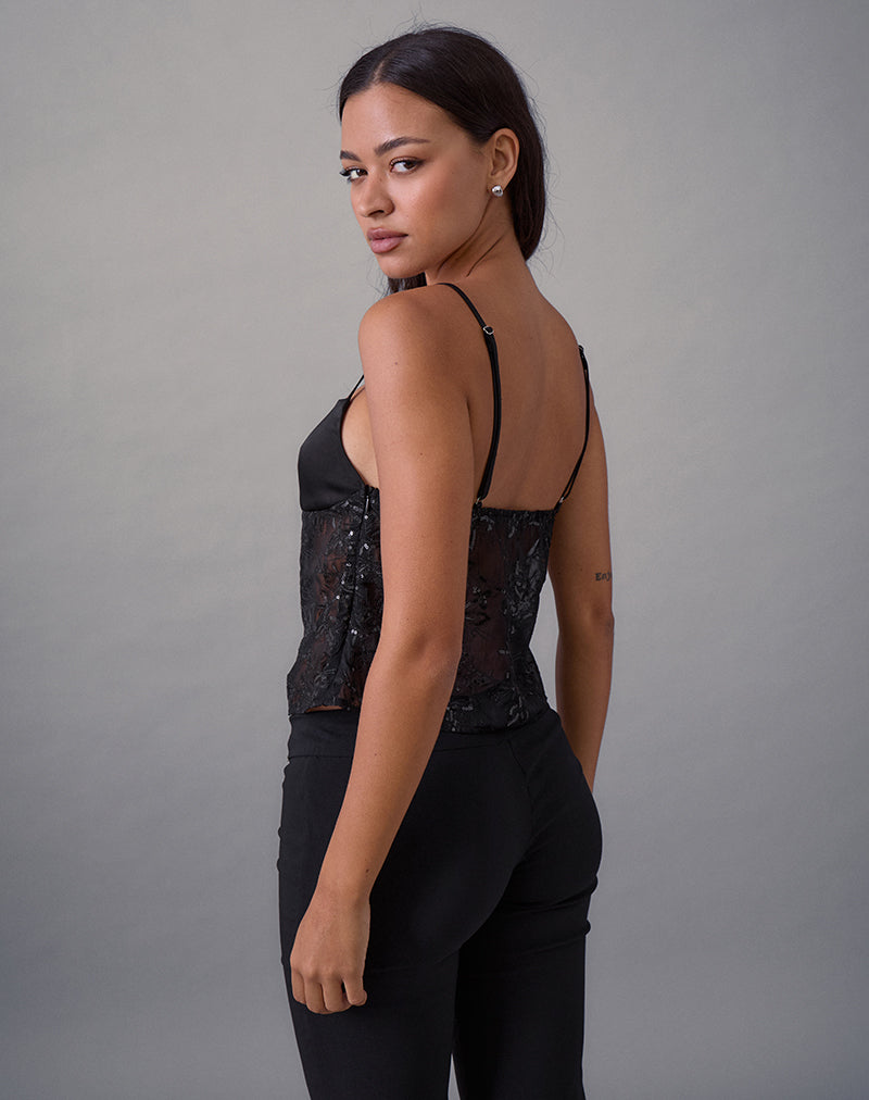 Image of Rikasu Top aus floralem Chiffon mit Pailletten Schwarz