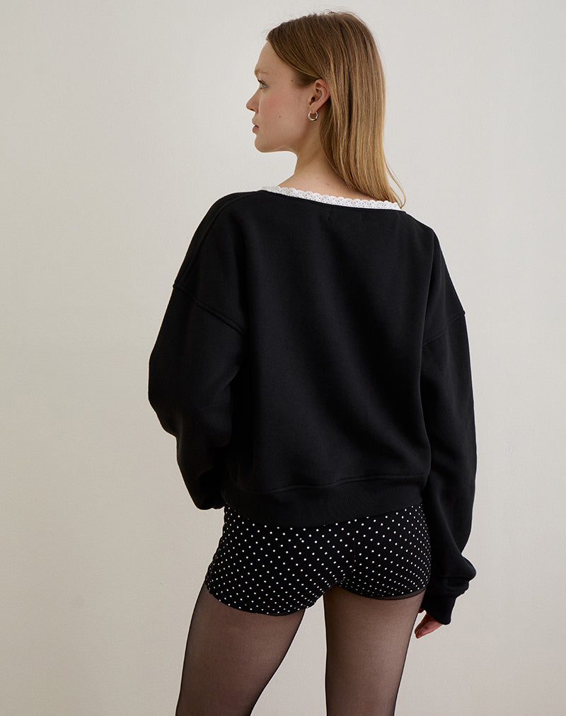 Image of Rodyn Pullover in Schwarz mit weißer Picot-Bindung