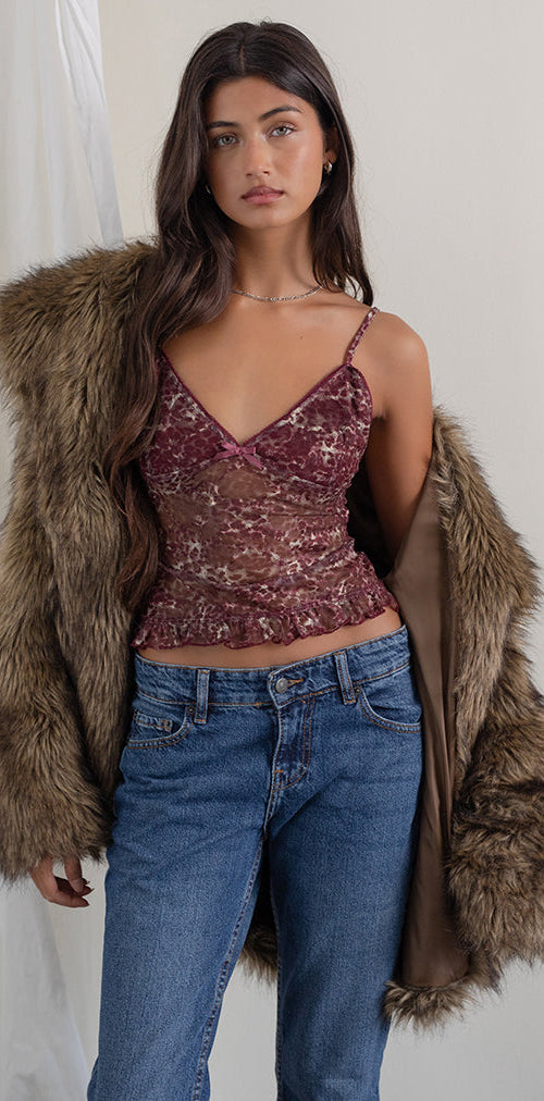 Image of Rumaysa Top aus bedruckter Spitze und abstrakten Leopardenflecken