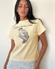 Bild von Sakha Boxy Top in Buttermilch mit blauem Party Girl Era Print