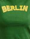 Ulmengrün mit gelbem Einband und Berliner Emblem