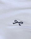 Weiß mit marineblauem Einband