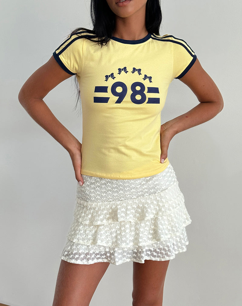 Abbildung des Salda Tee in Lemonade mit marineblauem Einband und '98' Emblem