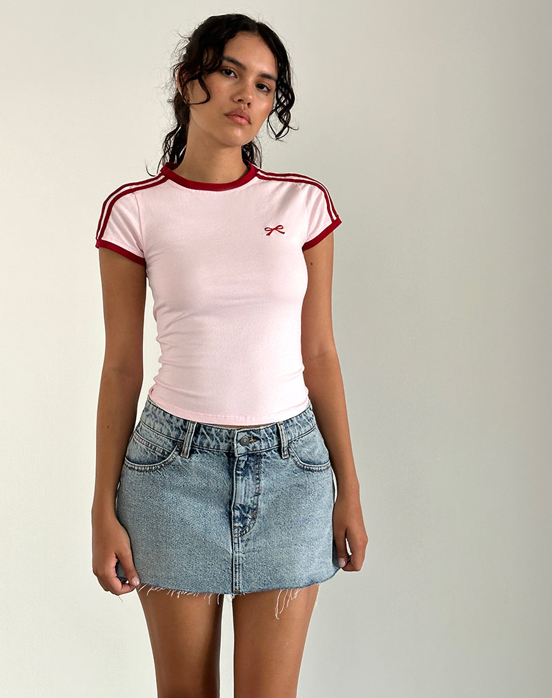 Image of Salda Top in Hellrosa mit roter Adrenalin-Bindung und Schleifen-Stickerei