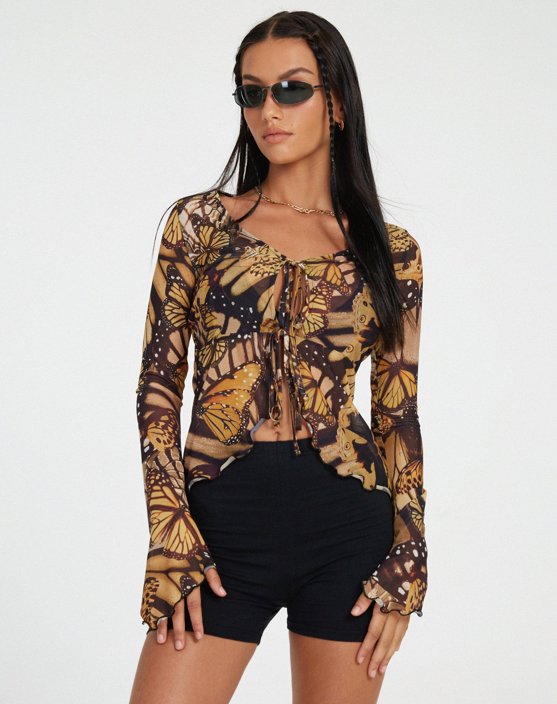 Bild von Sansa Cardi in Schmetterlingsgold