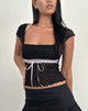 Image of Sherine Spitzen-Top in Schwarz mit rosa Schleife