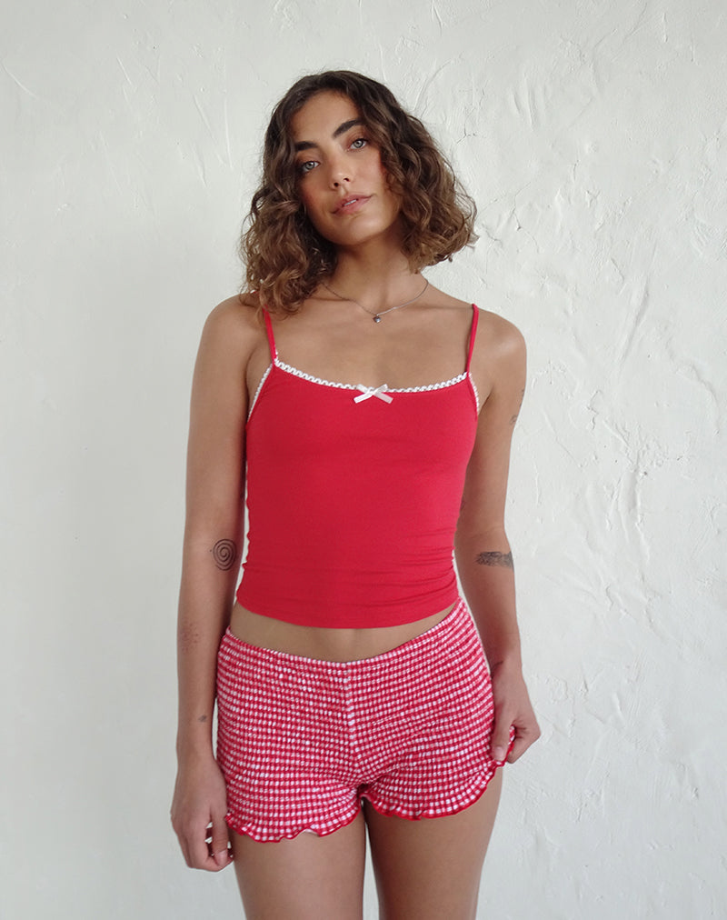 Suna Vest Top in Tangorot mit elfenbeinfarbenem Besatz