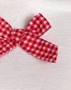 Weiß mit roter Gingham-Schleife