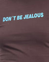 Tiefes Mahagoni mit "Don't Be Jelous"-Slogan