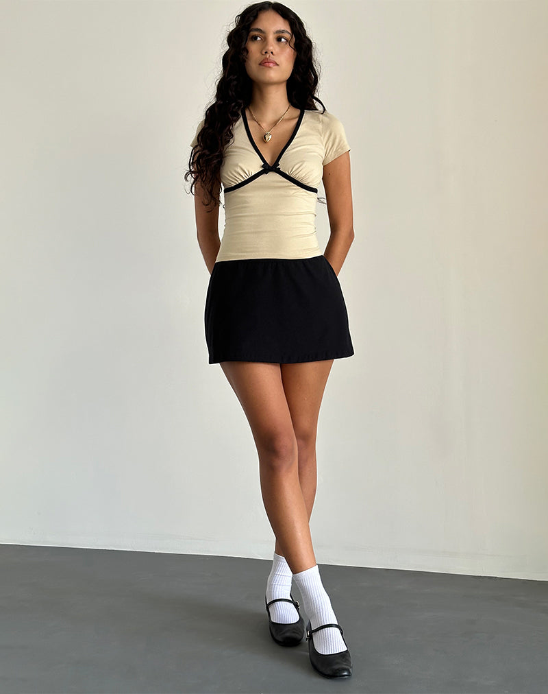 Image of Tasina Top in Kokosnussmilch mit schwarzem Einband