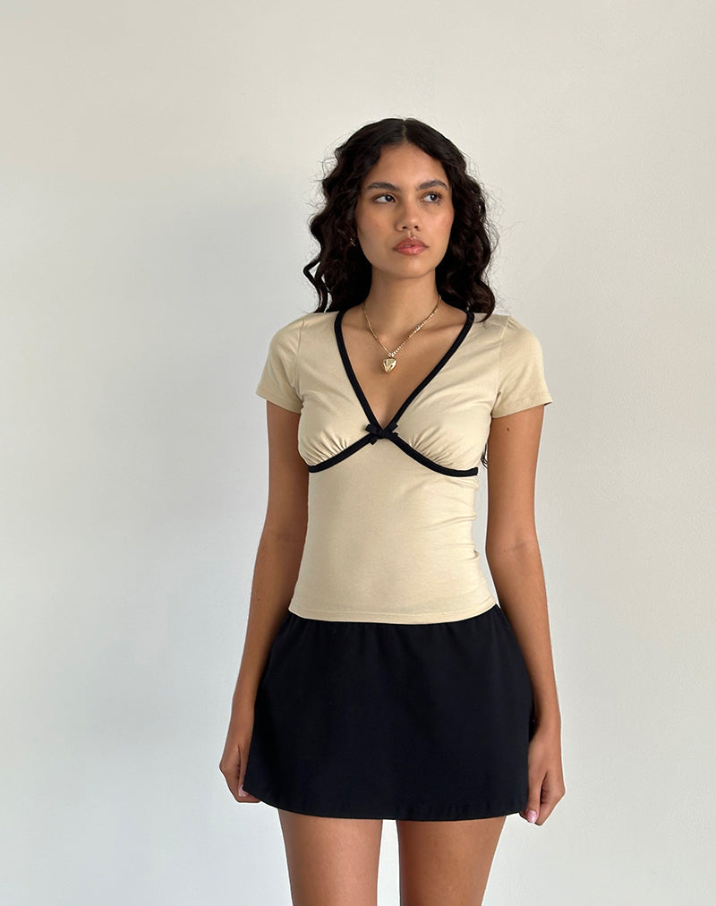 Image of Tasina Top in Kokosnussmilch mit schwarzem Einband