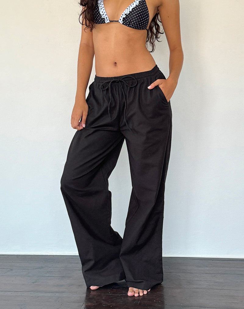 Image of Wasic Weite Leinenhosen in Schwarz