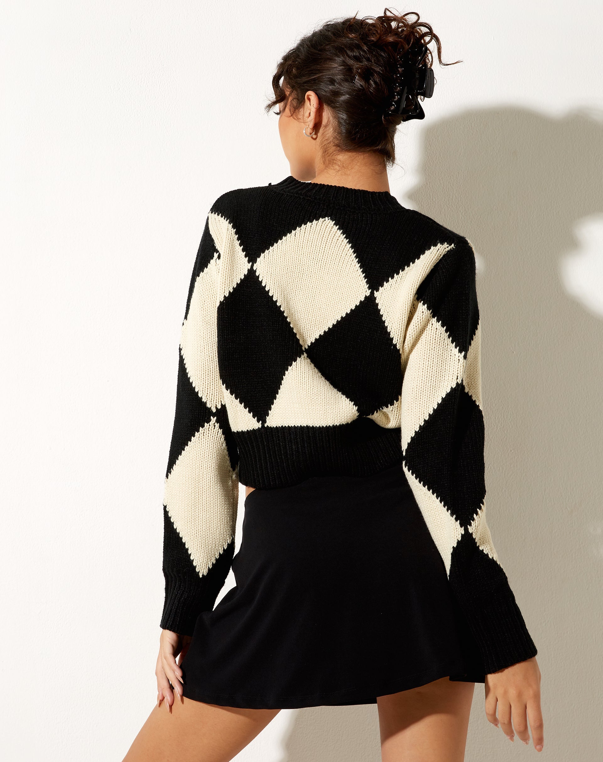 Bild von Binda Pullover in Harlequin Schwarz und Off White