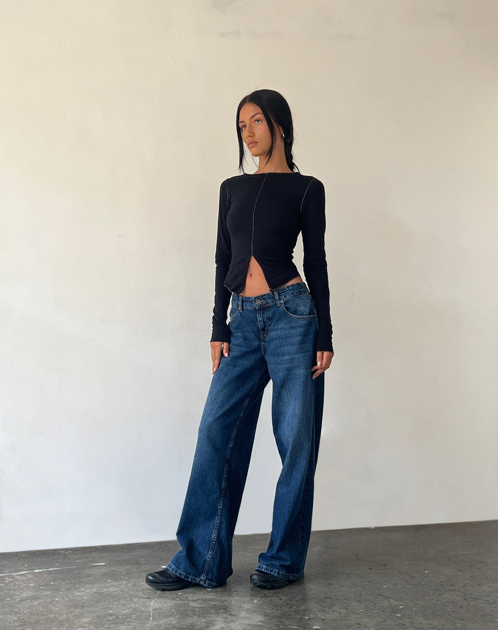 Fenrin Langärmeliges Schmetterlings-Jersey-Top in Schwarz