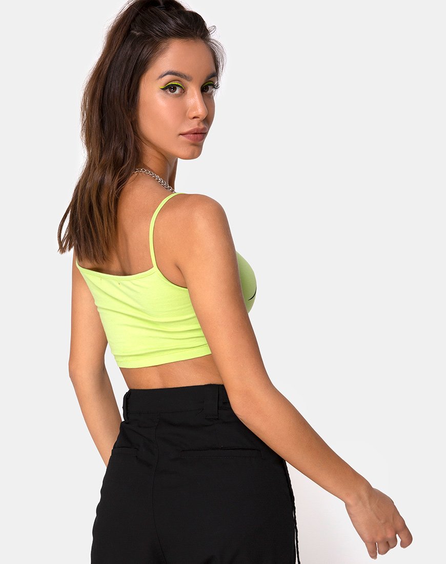 Bild von Kini Crop Top in Grün mit schwarzer Tribal-Plazierung