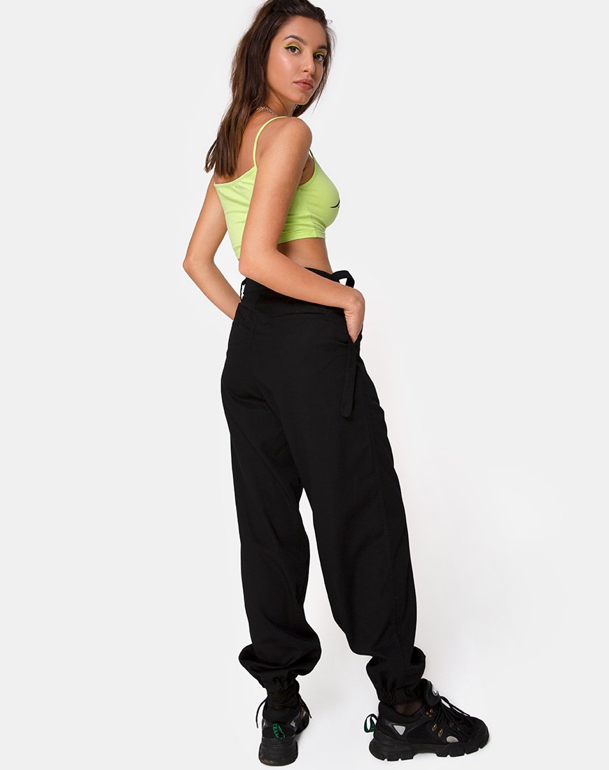 Bild von Kini Crop Top in Grün mit schwarzer Tribal-Plazierung