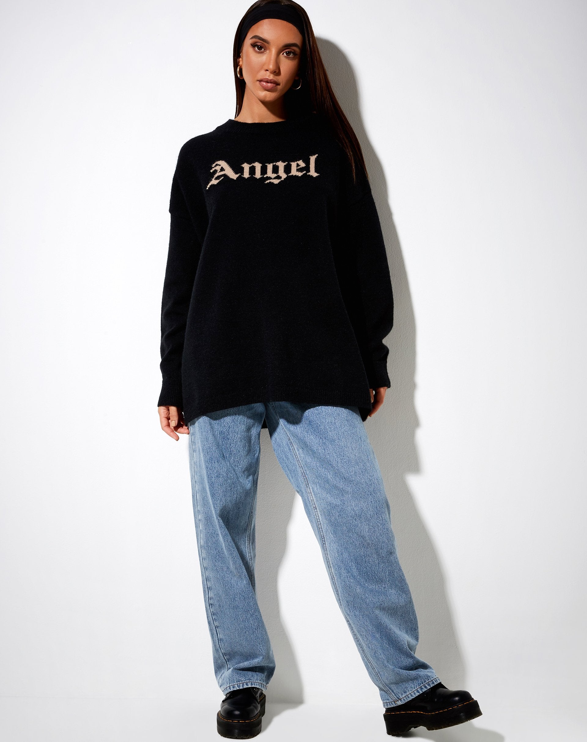 Image of Lulees Pullover aus schwarzem Strick mit Engel in Creme