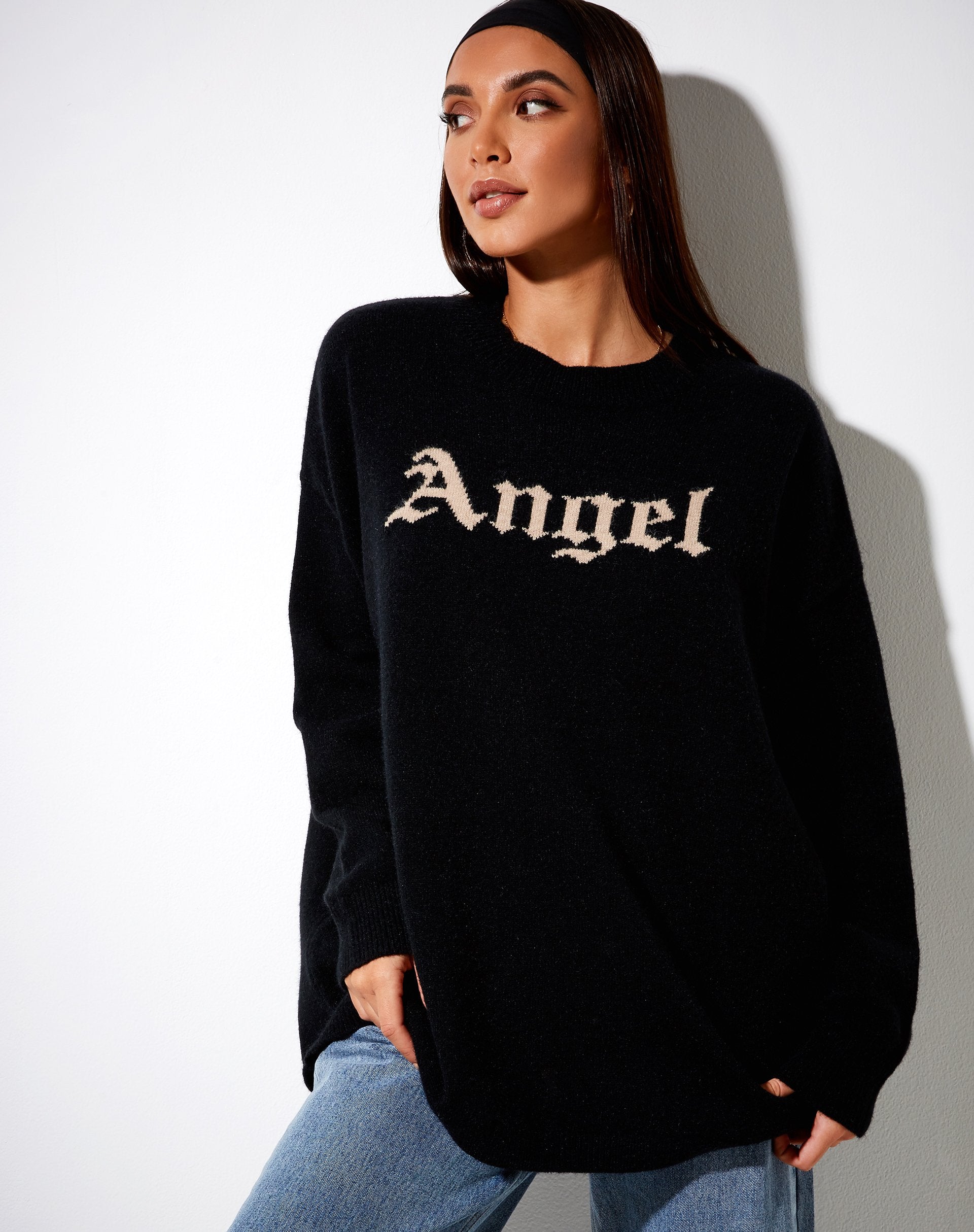 Image of Lulees Pullover aus schwarzem Strick mit Engel in Creme