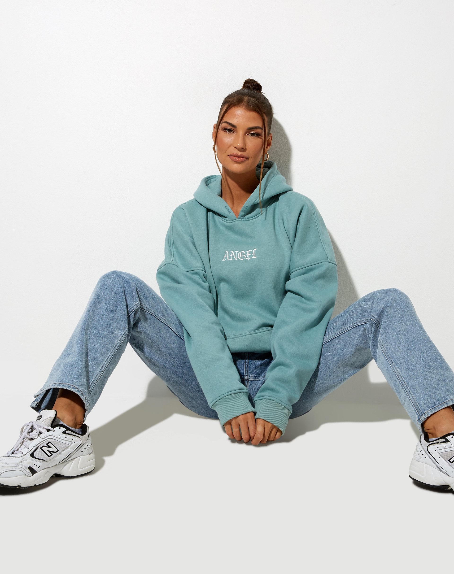 Bild von Oversize-Kapuzenpulli mit Engelsemblem in Meeresblau