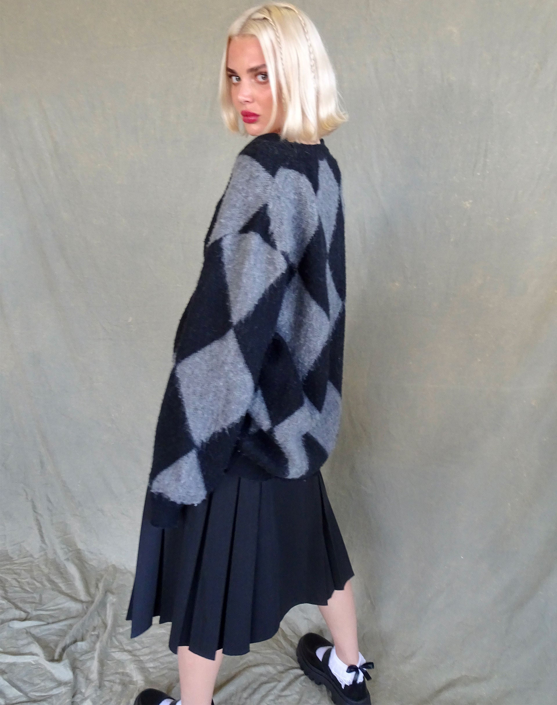 Bild von Aureli Cardi in Harlekin Grau und Schwarz