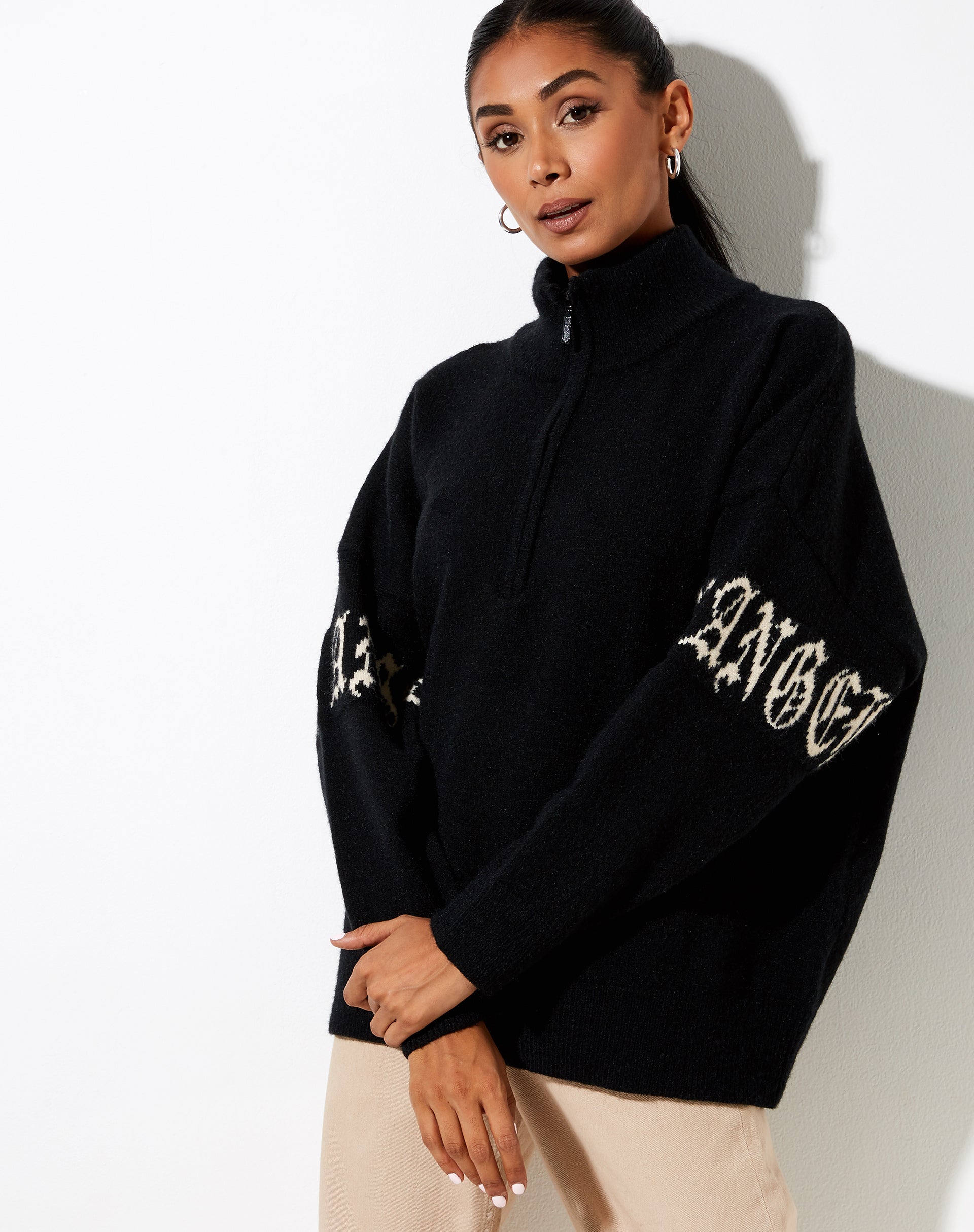 Image of Tusca Sweatshirt in Schwarz mit Engel auf dem Ärmel