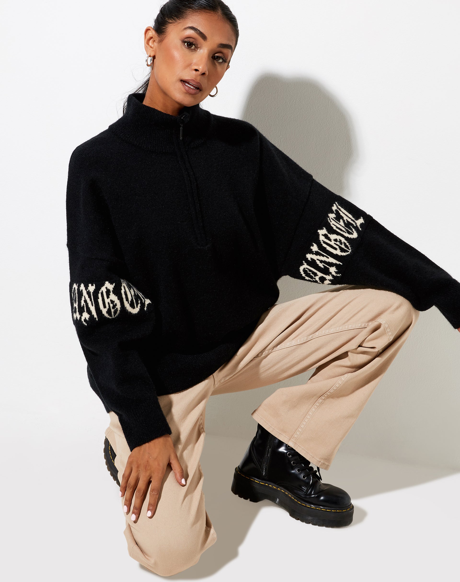 Image of Tusca Sweatshirt in Schwarz mit Engel auf dem Ärmel